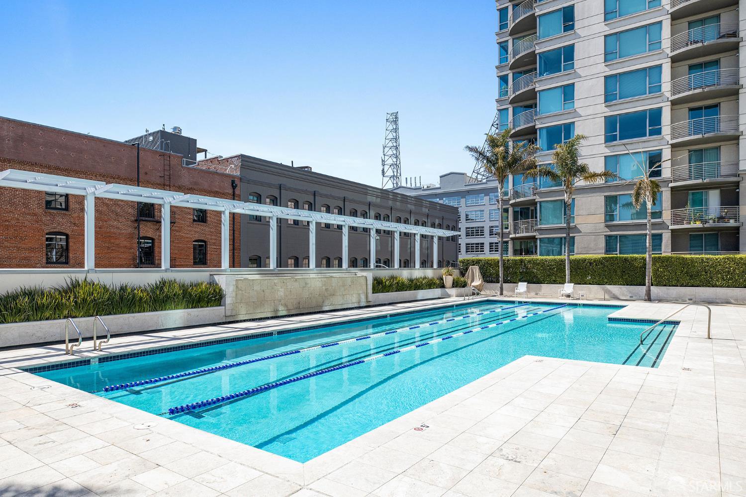 229 Brannan Street, Unit 12C San Francisco, CA 94107 - Photo 40 of 57 a view of a building with a swimming pool