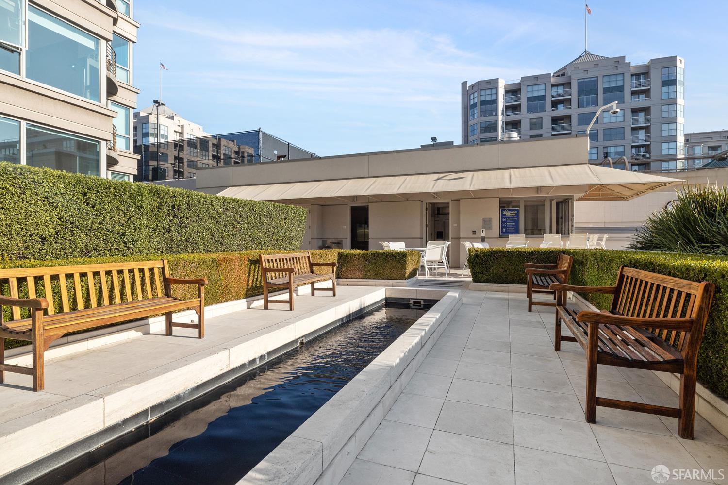 229 Brannan Street, Unit 12C San Francisco, CA 94107 - Photo 46 of 57 a view of a chairs and tables in the balcony