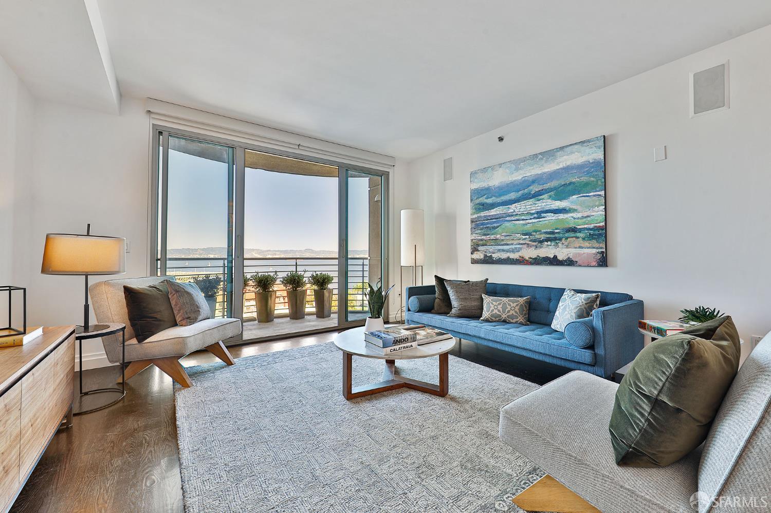 229 Brannan Street, Unit 12C San Francisco, CA 94107 - Photo 9 of 57 a living room with furniture and a large window