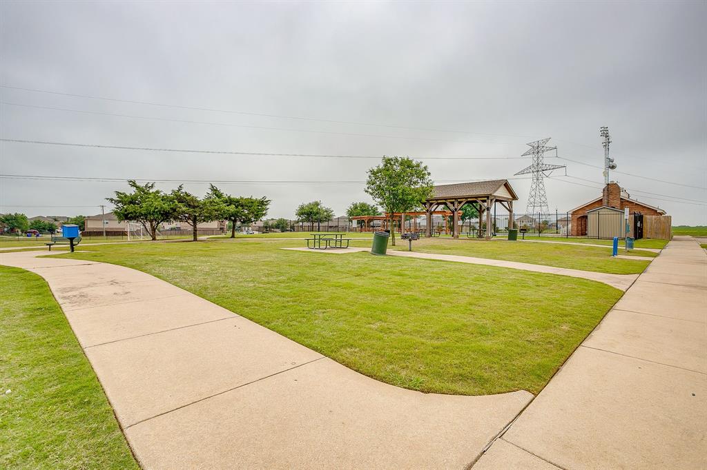 136 Kennedy Drive Venus, TX 76084 - Photo 25 of 27 a view of a swimming pool with a yard and sitting area
