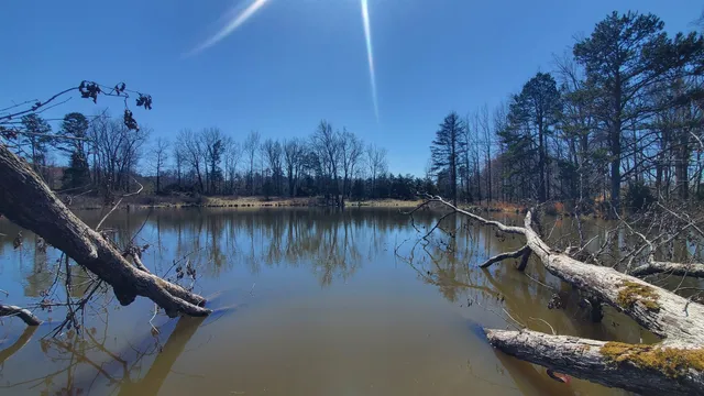 a view of a lake from a balcony
