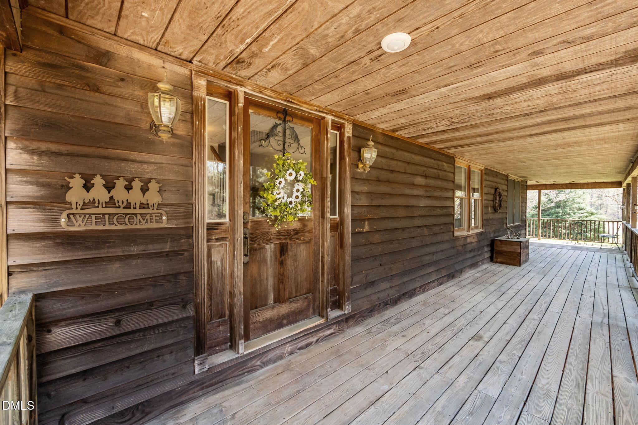 212 Thomas Humphries Road Roxboro, NC 27574 - Photo 45 of 56 a view of a porch with wooden floor