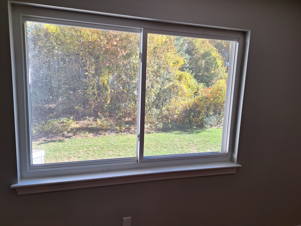 4 Beal's Cove Road, Unit F Hingham, MA 02043 - Photo 9 of 22 a view of a room with a large window