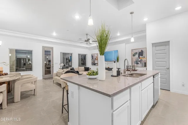 a spacious bathroom with sinks and a bathtub