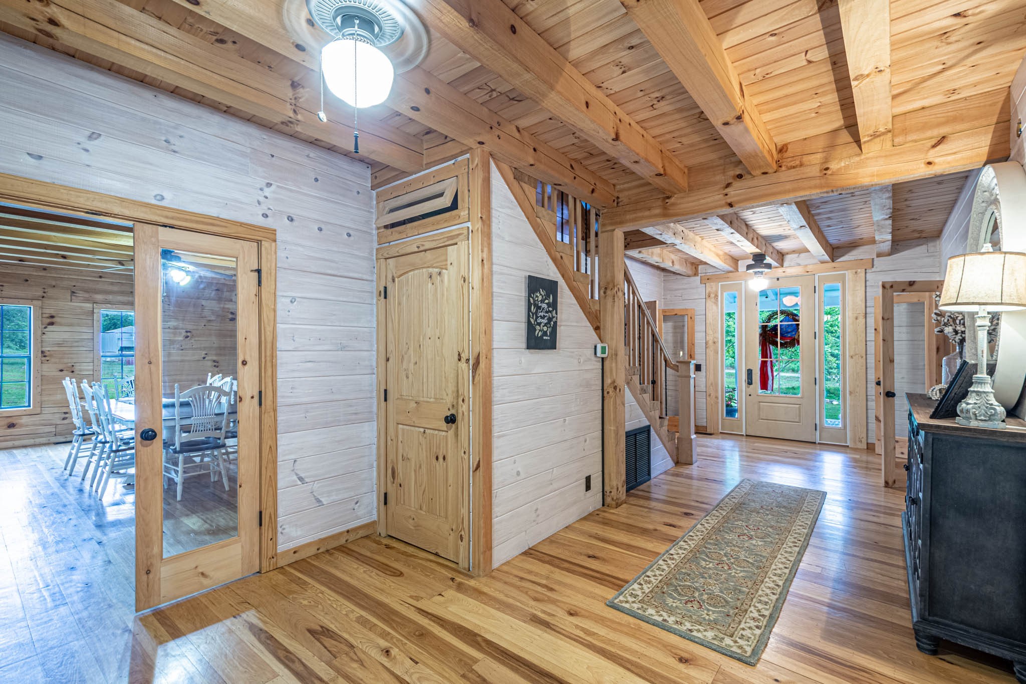860 Loyd Road Pulaski, TN 38478 - Photo 12 of 70 a view of a hallway with wooden floor and staircase