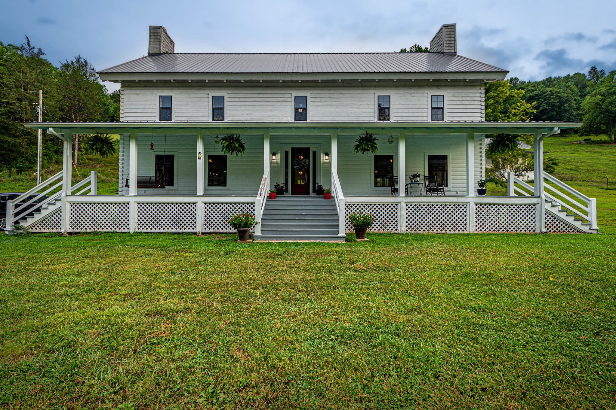 860 Loyd Road Pulaski, TN 38478 - Photo 2 of 70 a front view of a house with a yard