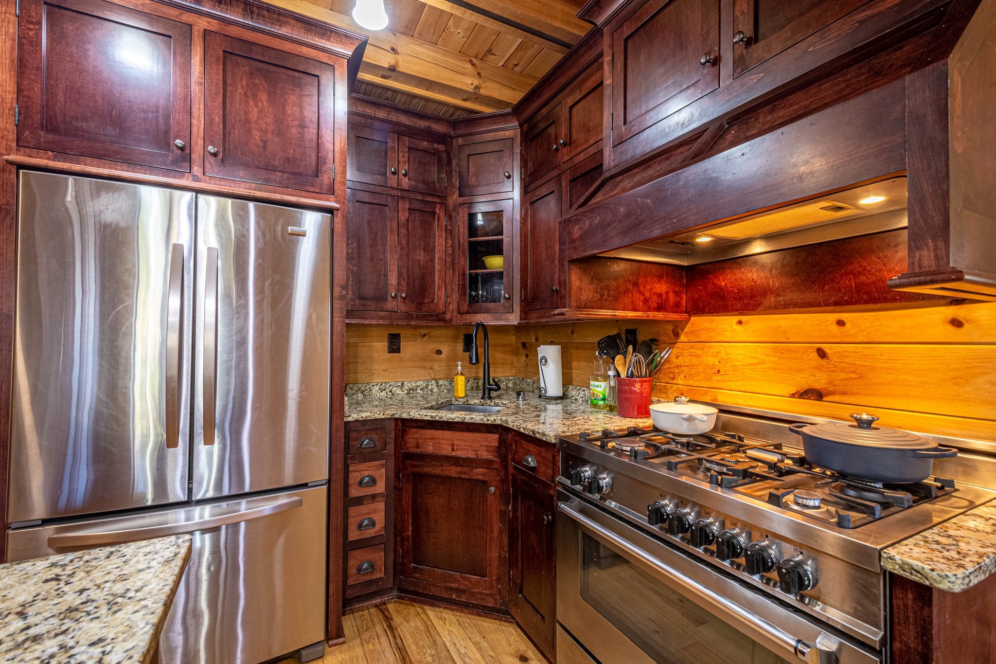 860 Loyd Road Pulaski, TN 38478 - Photo 21 of 70 a kitchen with stainless steel appliances granite countertop a refrigerator a stove and a sink