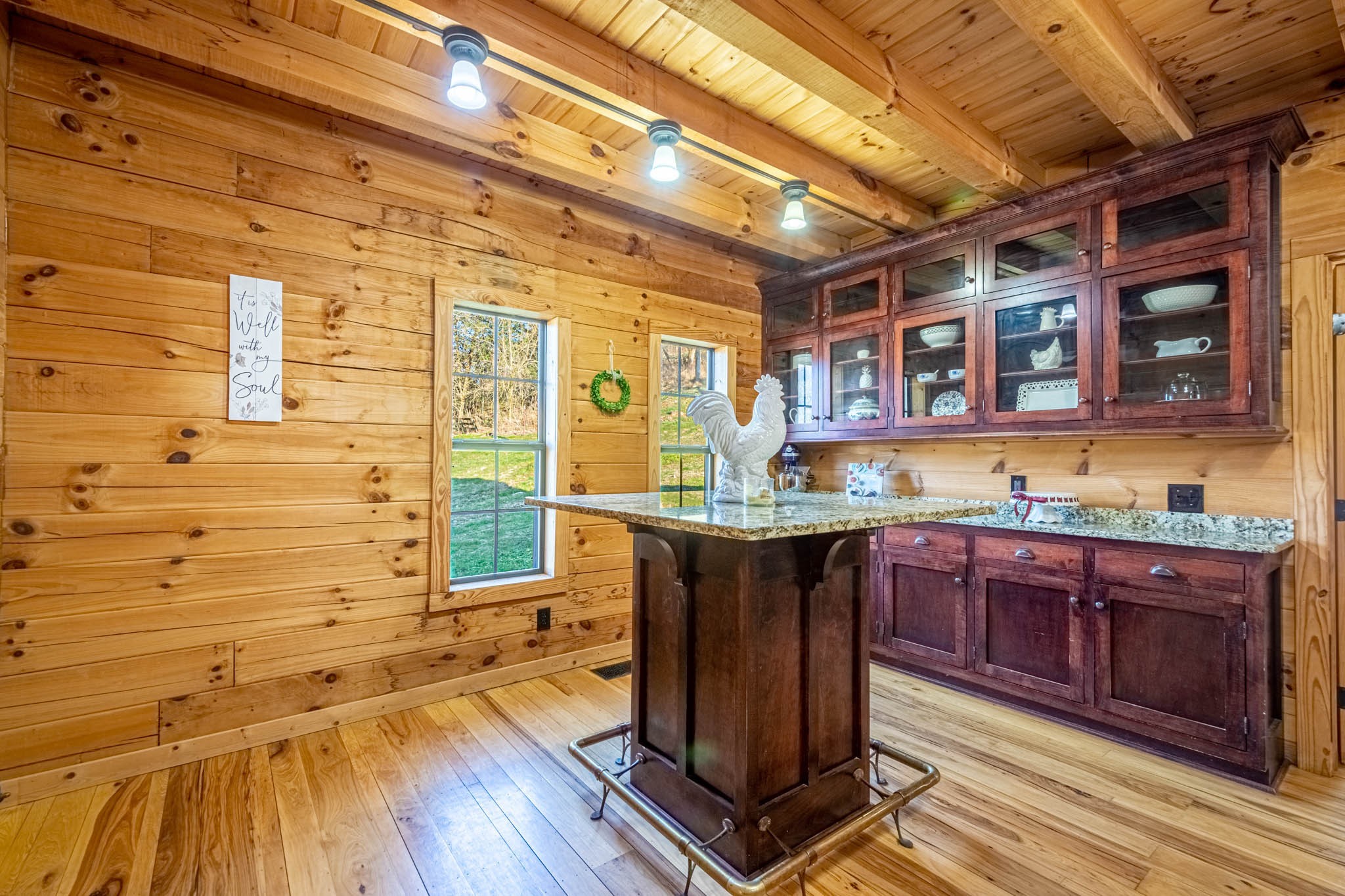 860 Loyd Road Pulaski, TN 38478 - Photo 24 of 70 a bath room with a sink and cabinets