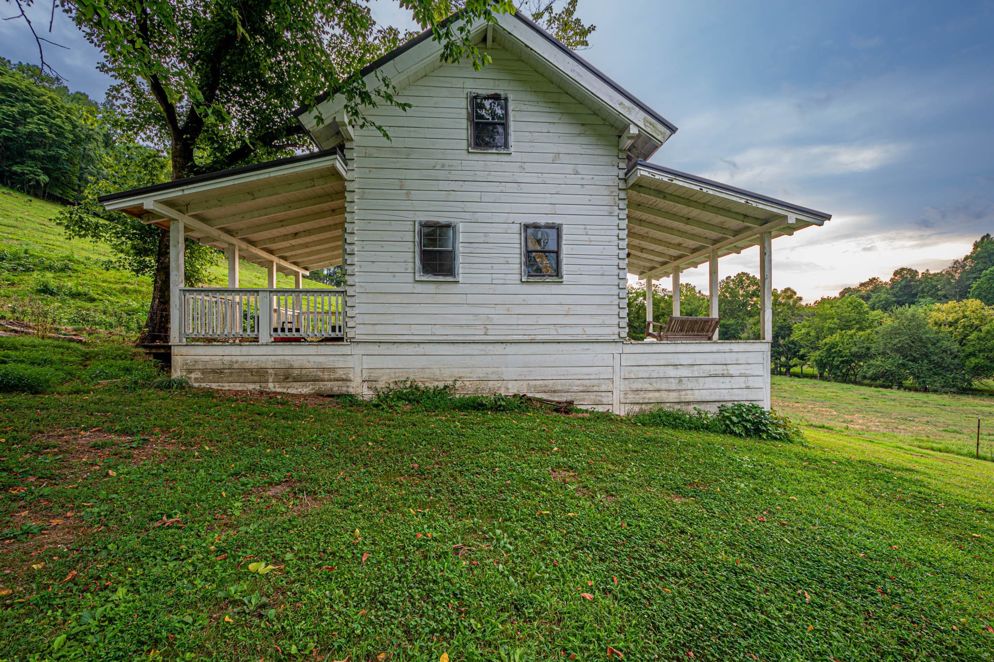 860 Loyd Road Pulaski, TN 38478 - Photo 58 of 70 a view of backyard with plants and outdoor seating