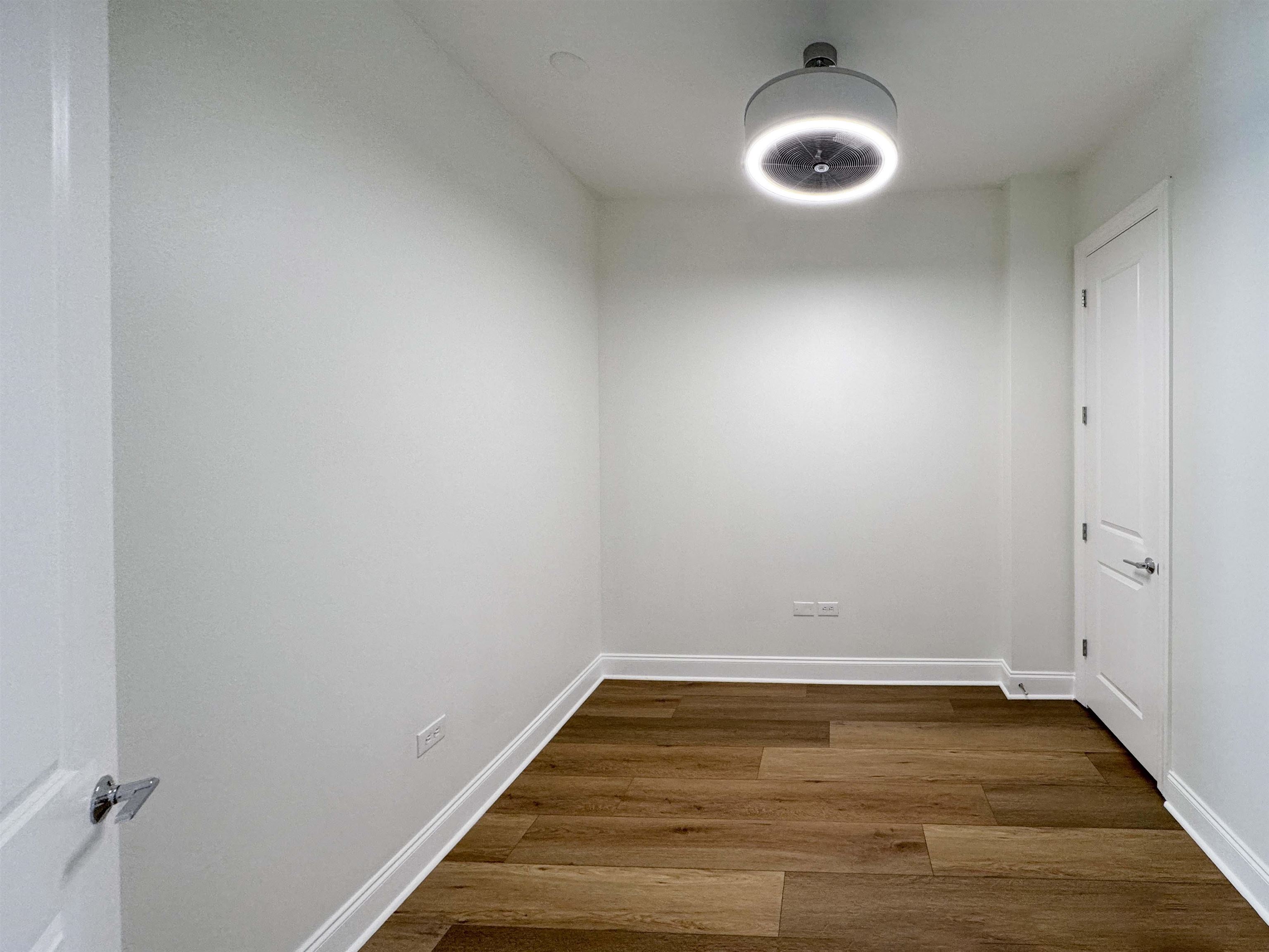 717 Riverside Drive, Unit 707 Memphis, TN 38103 - Photo 18 of 39 Unfurnished office or bedroom featuring dark hardwood / wood-style flooring