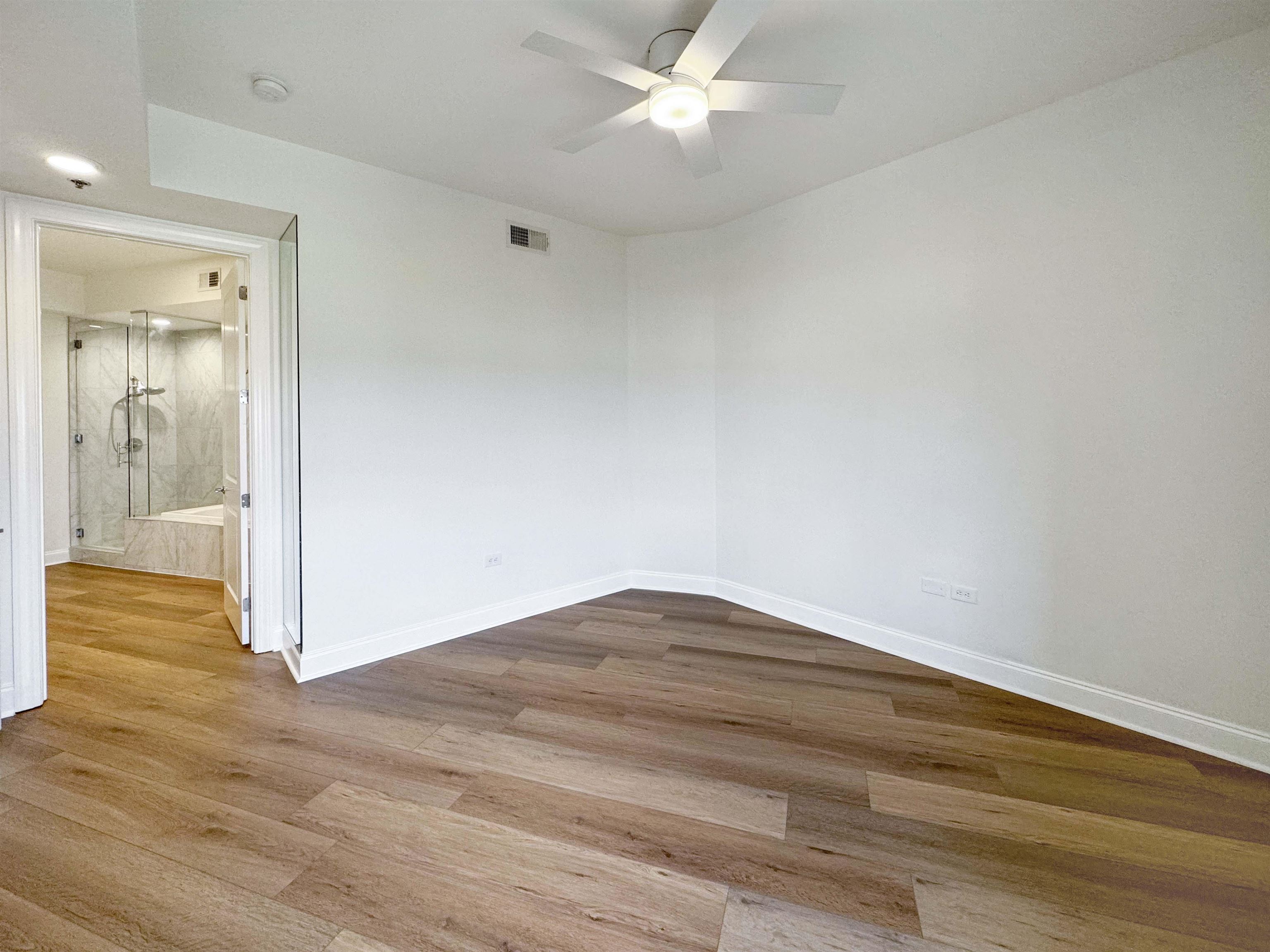 717 Riverside Drive, Unit 707 Memphis, TN 38103 - Photo 25 of 39 Spare room with ceiling fan and hardwood / wood-style flooring