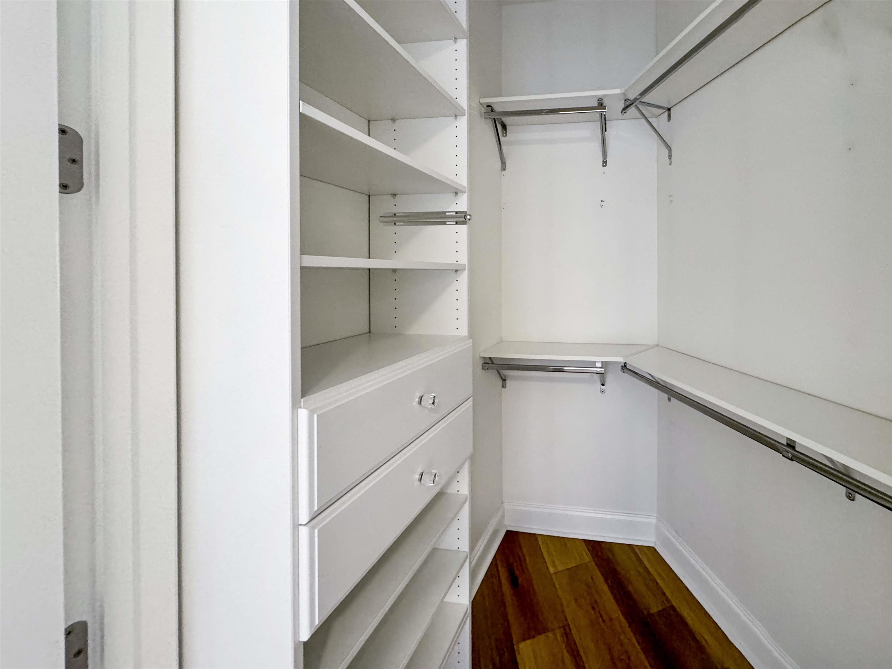 717 Riverside Drive, Unit 707 Memphis, TN 38103 - Photo 26 of 39 Spacious closet featuring dark wood-type flooring