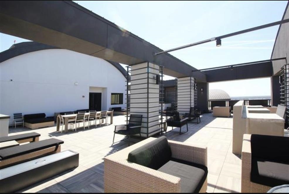 717 Riverside Drive, Unit 707 Memphis, TN 38103 - Photo 32 of 39 View of patio / terrace featuring an outdoor hangout area
