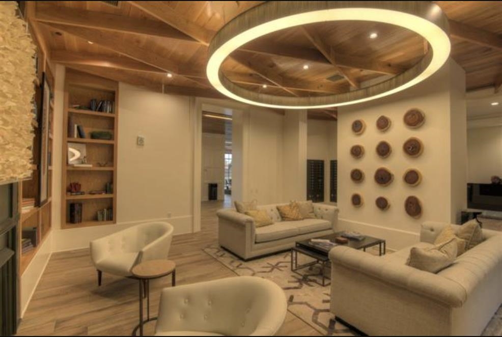 717 Riverside Drive, Unit 707 Memphis, TN 38103 - Photo 33 of 39 Living room with wooden ceiling, built in features, beamed ceiling, and light wood-type flooring
