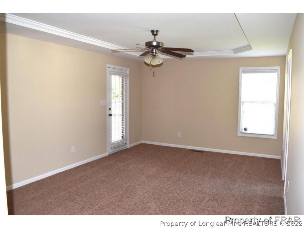 192 Lennox Loop Raeford, NC 28376 - Photo 23 of 33 a view of an empty room with a window