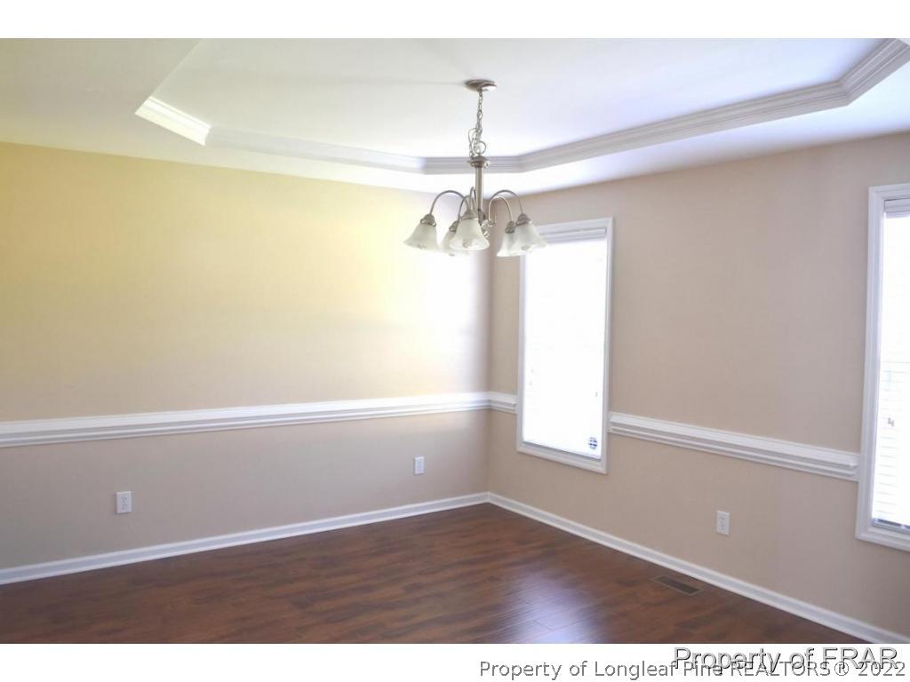 192 Lennox Loop Raeford, NC 28376 - Photo 10 of 33 a view of a small space with wooden floor and a window