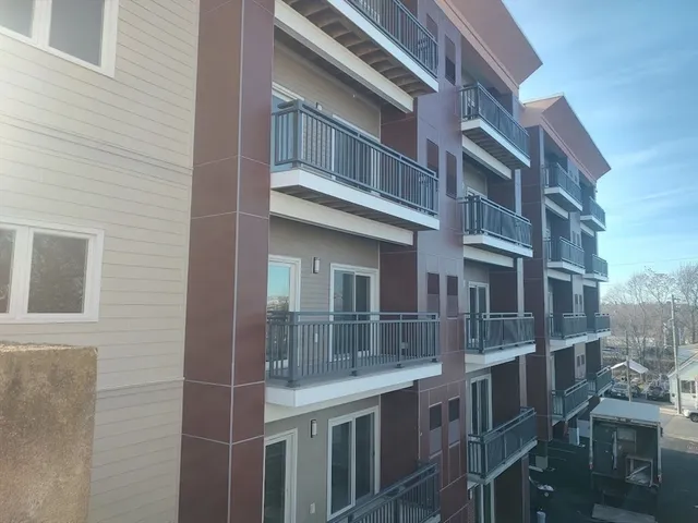 a view of a building with a street