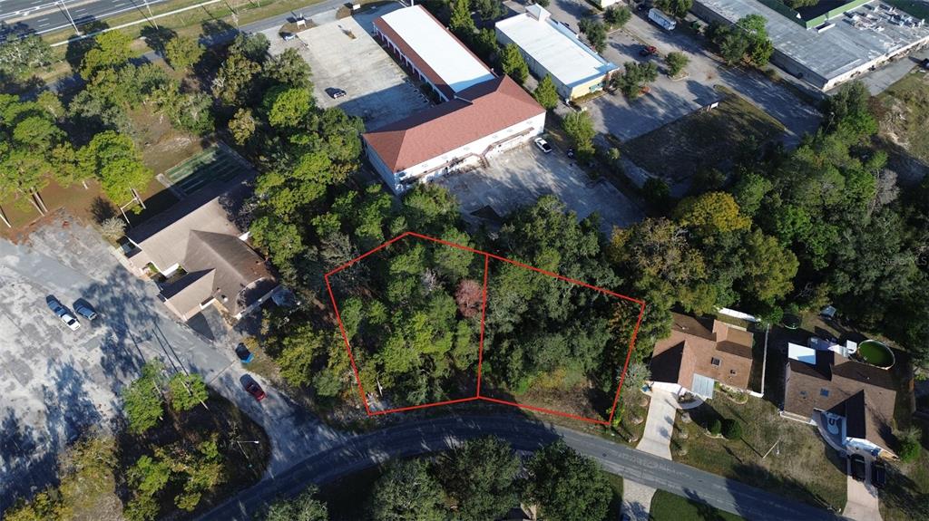 7939 Rhanbuoy Road Spring Hill, FL 34606 - Photo 10 of 10 an aerial view of a house with a yard