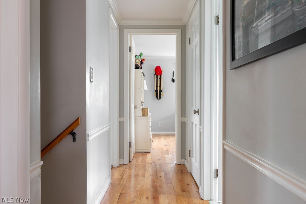 22732 Rye Road Beachwood, OH 44122 - Photo 15 of 27 The long hallway with newer hardwoods, a cedar lined closet, and a linen closet.