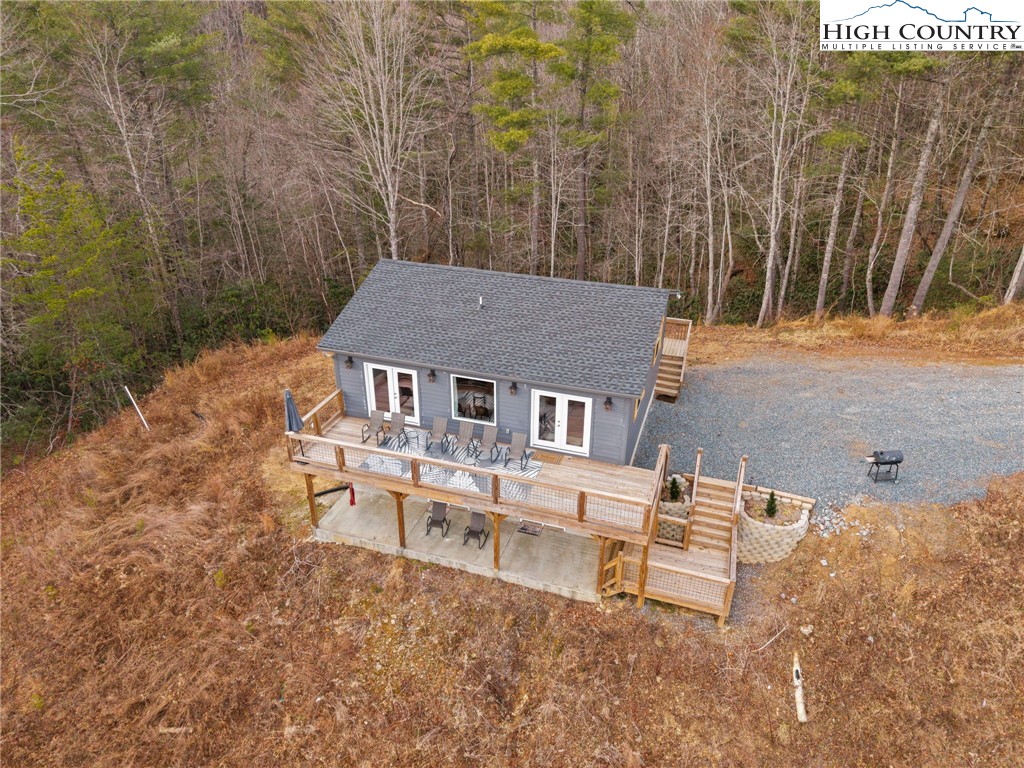 482 Bear Run Road Lenoir, NC 28645 - Photo 39 of 44 aerial view of a house with backyard and trees