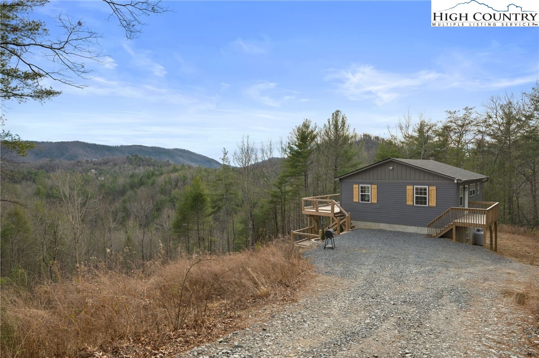 482 Bear Run Road Lenoir, NC 28645 - Photo 43 of 44 a house view with a garden space