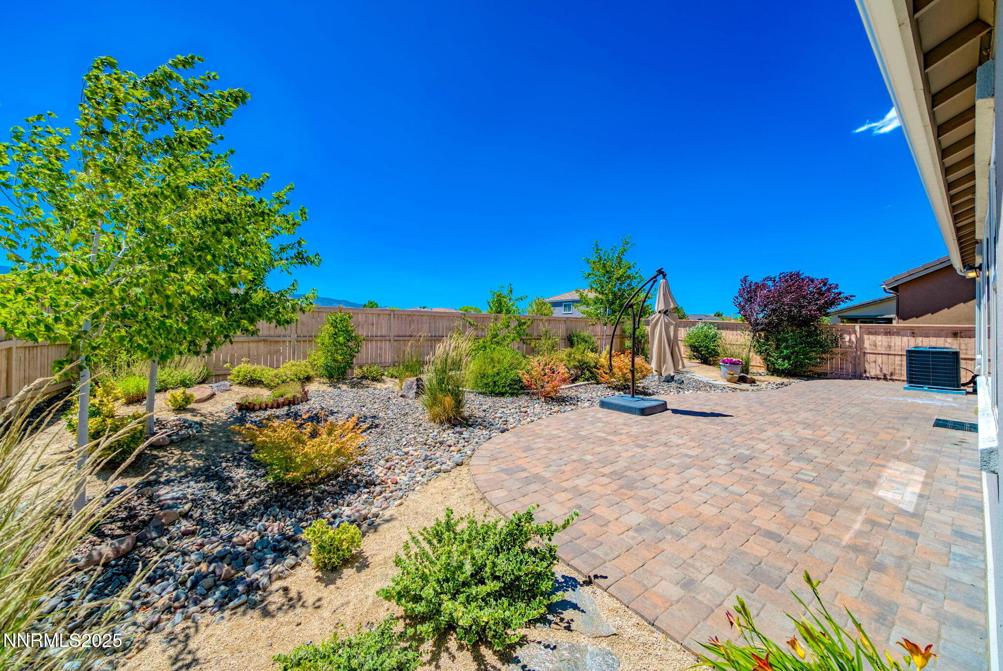 10455 Mott Court Reno, NV 89521 - Photo 31 of 41 a view of a garden with a house