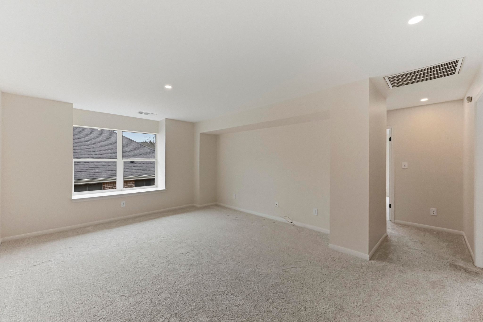 11200 Savin Hill Lane Austin, TX 78739 - Photo 17 of 32 a view of an empty room with a window