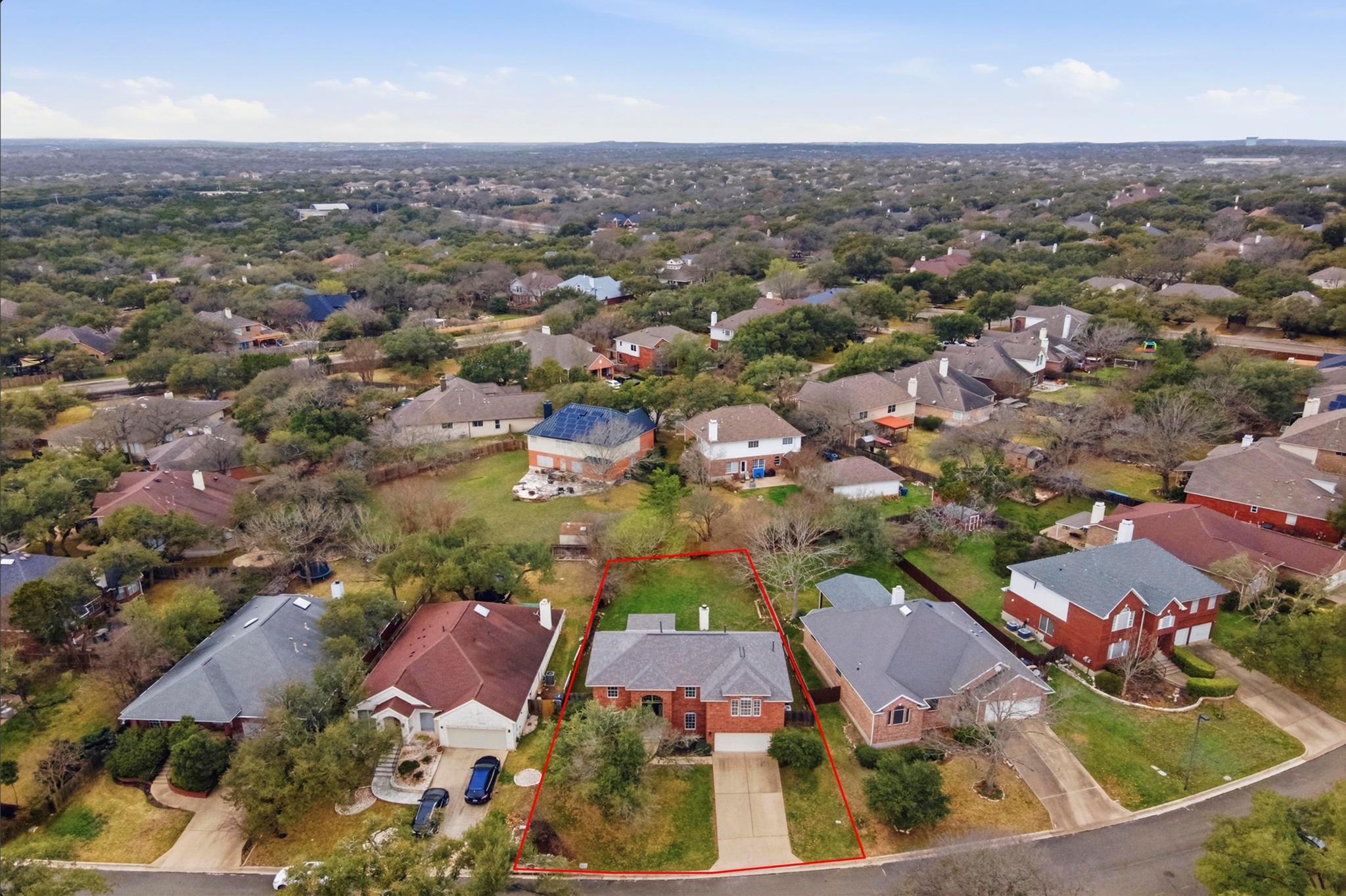 11200 Savin Hill Lane Austin, TX 78739 - Photo 27 of 32 an aerial view of residential houses with outdoor space