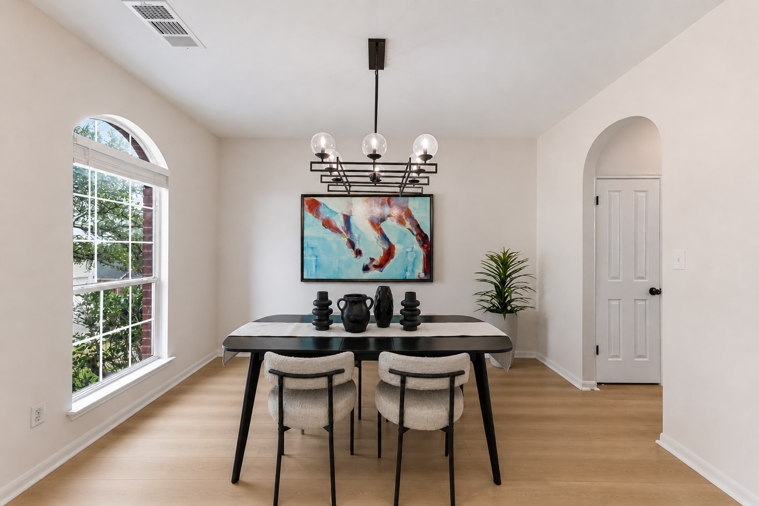 11200 Savin Hill Lane Austin, TX 78739 - Photo 4 of 32 a view of a dining room with furniture window and wooden floor