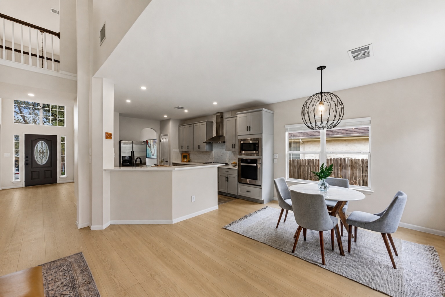11200 Savin Hill Lane Austin, TX 78739 - Photo 6 of 32 a view of kitchen with dining table and chairs