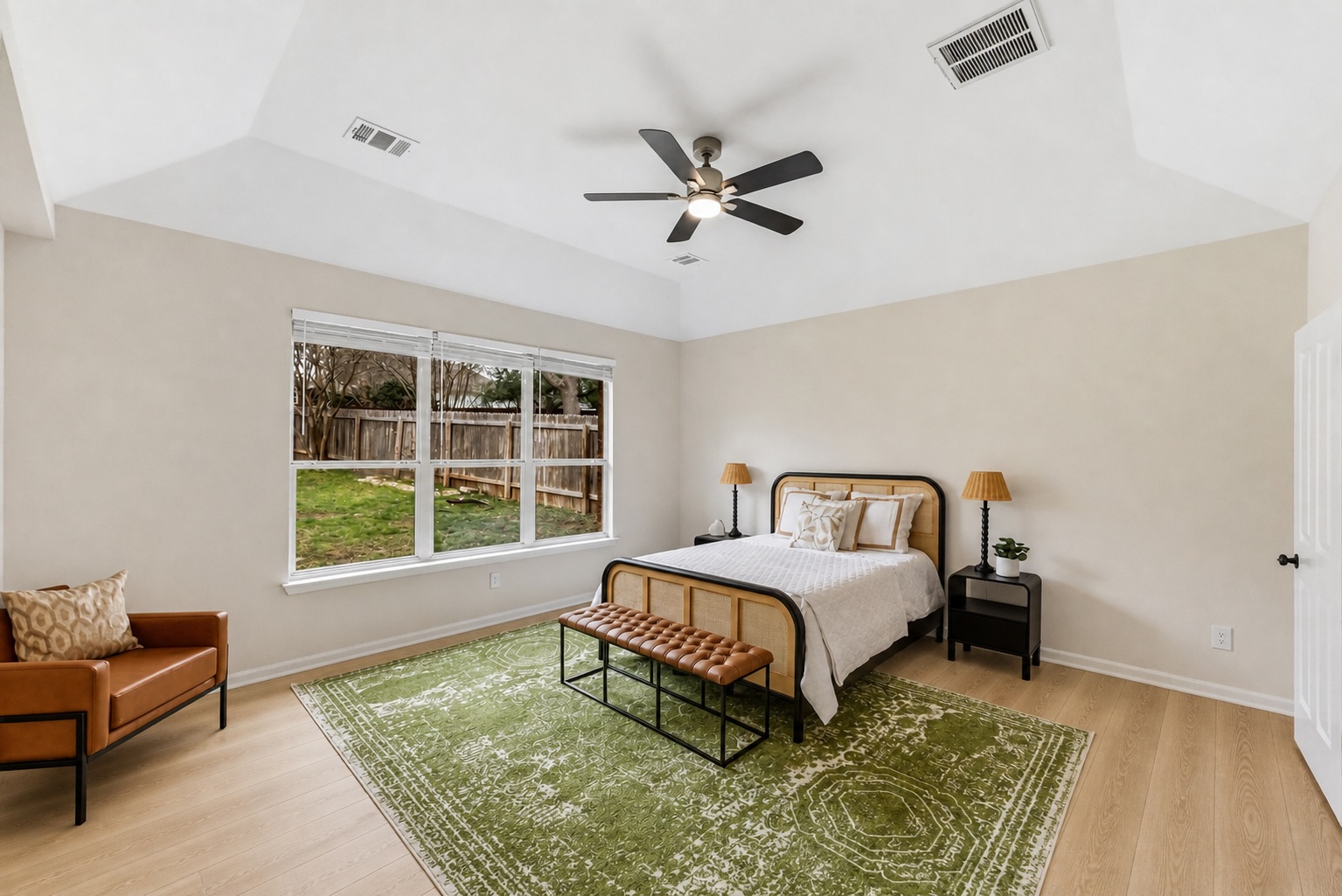 11200 Savin Hill Lane Austin, TX 78739 - Photo 9 of 32 a bedroom with a bed and window