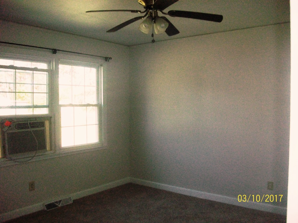 2040 Corinth Drive Seneca, SC 29672 - Photo 5 of 10 This cozy room offers natural light and comfortable living.