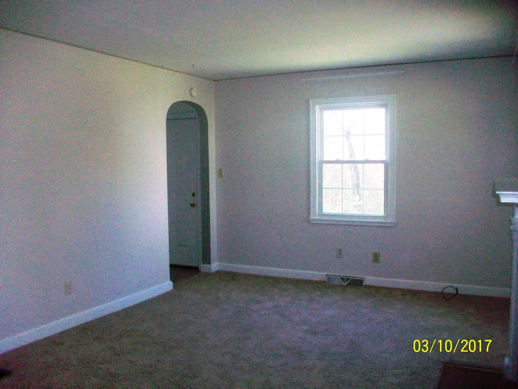 2040 Corinth Drive Seneca, SC 29672 - Photo 10 of 10 This inviting space features warm carpeting and ample natural light, perfect for comfortable living.