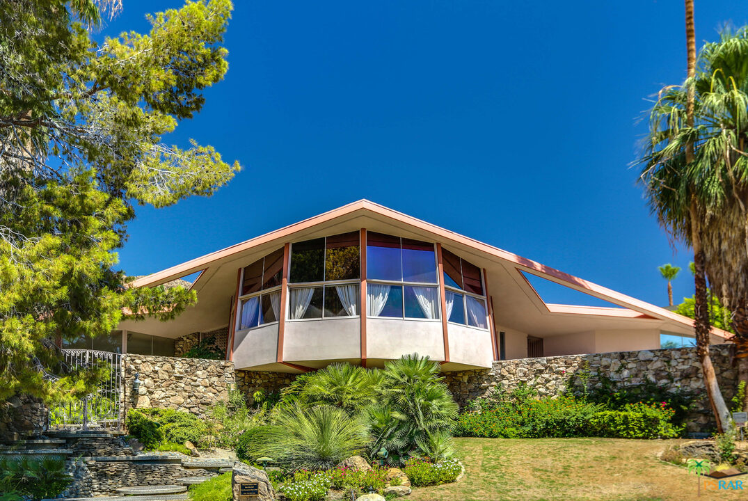 1350 Ladera Circle Palm Springs, CA 92262 - Photo 1 of 50 a front view of a house with a yard