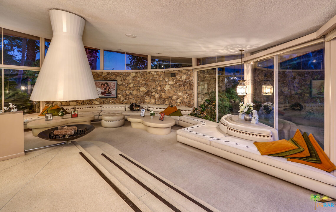 1350 Ladera Circle Palm Springs, CA 92262 - Photo 21 of 50 a kitchen with stainless steel appliances granite countertop a sink and a stove