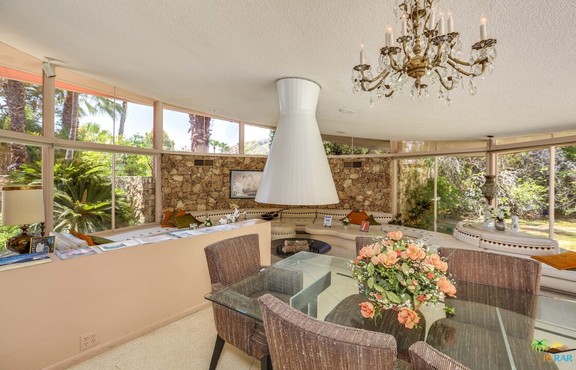 1350 Ladera Circle Palm Springs, CA 92262 - Photo 25 of 50 a living room with furniture and a large window