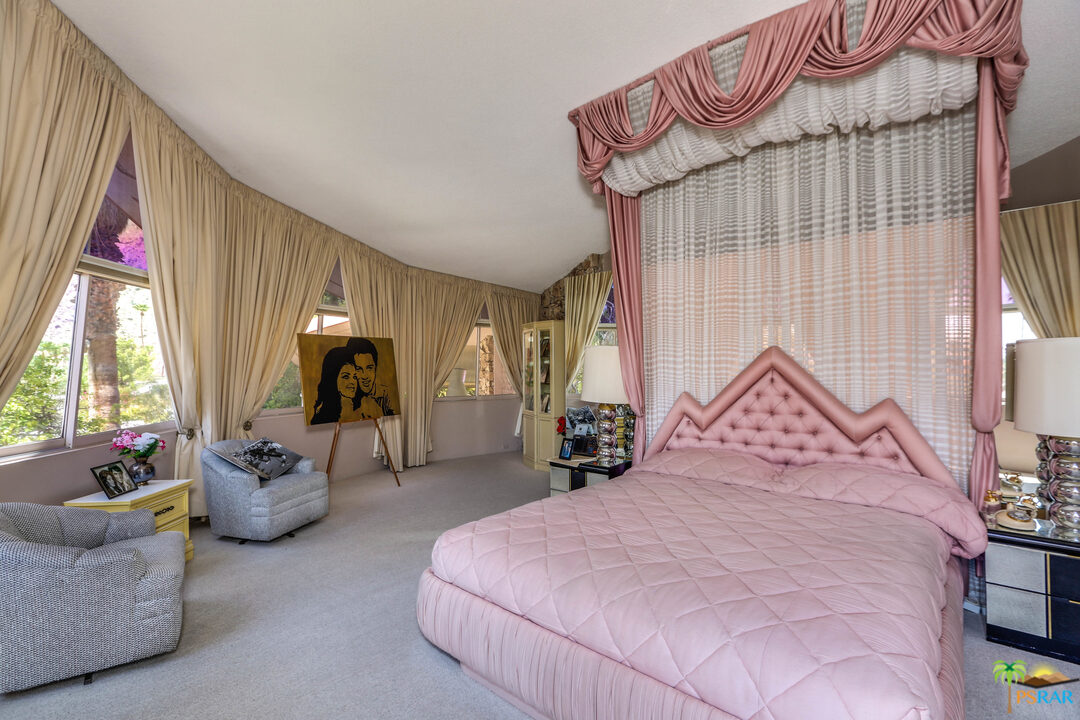 1350 Ladera Circle Palm Springs, CA 92262 - Photo 38 of 50 a bedroom with furniture and a window