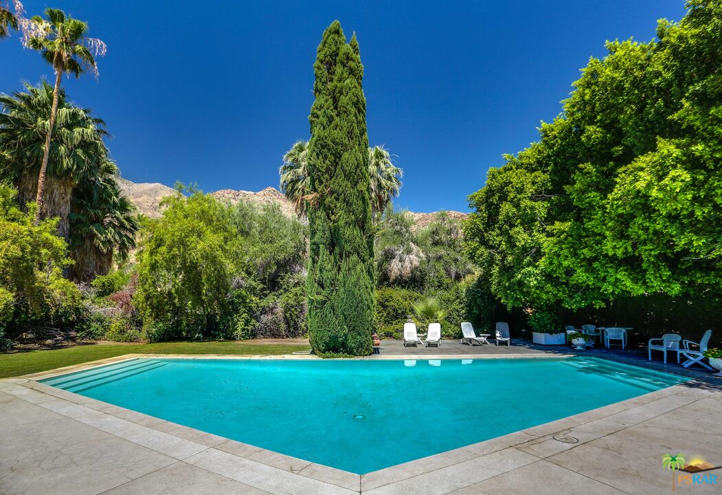 1350 Ladera Circle Palm Springs, CA 92262 - Photo 42 of 50 a view of a golf course with a garden