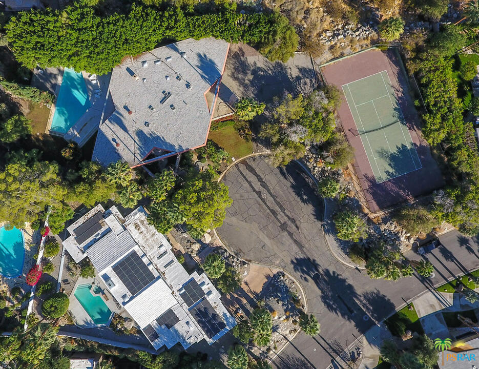 1350 Ladera Circle Palm Springs, CA 92262 - Photo 50 of 50 an aerial view of a house with a yard and a large tree