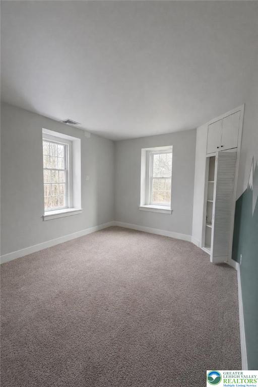 10637 Schantz Road Breinigsville, PA 18031 - Photo 15 of 19 a view of a big room with windows and closet