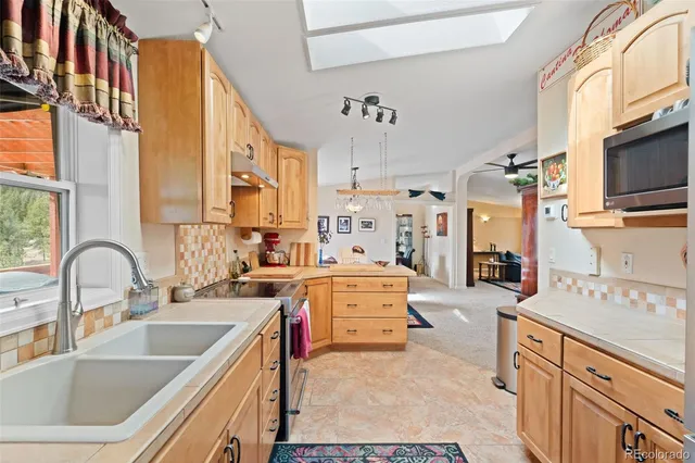 a view of balcony with furniture