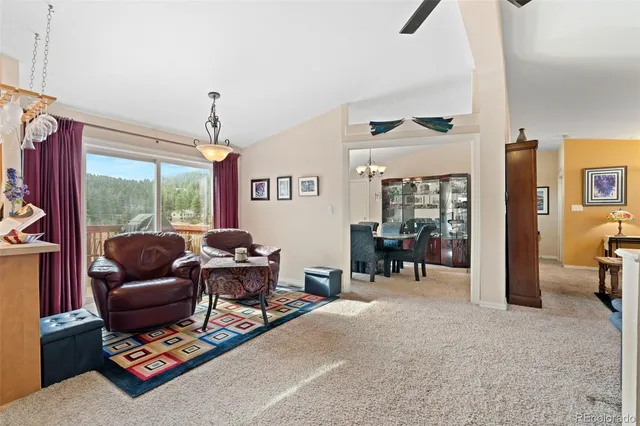 a bathroom with a toilet a sink and a mirror