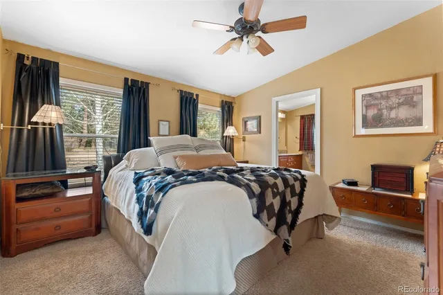 a bathroom with a sink toilet and a mirror