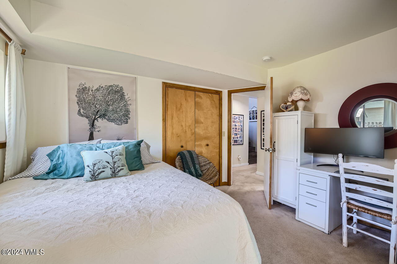 316 Golden Eagle Eagle, CO 81631 - Photo 20 of 25 a bedroom with a bed and a desk