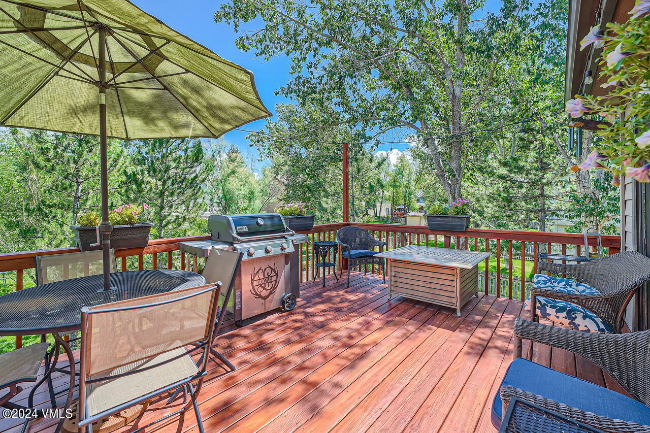 316 Golden Eagle Eagle, CO 81631 - Photo 23 of 25 a view of a chairs and table on the wooden roof deck