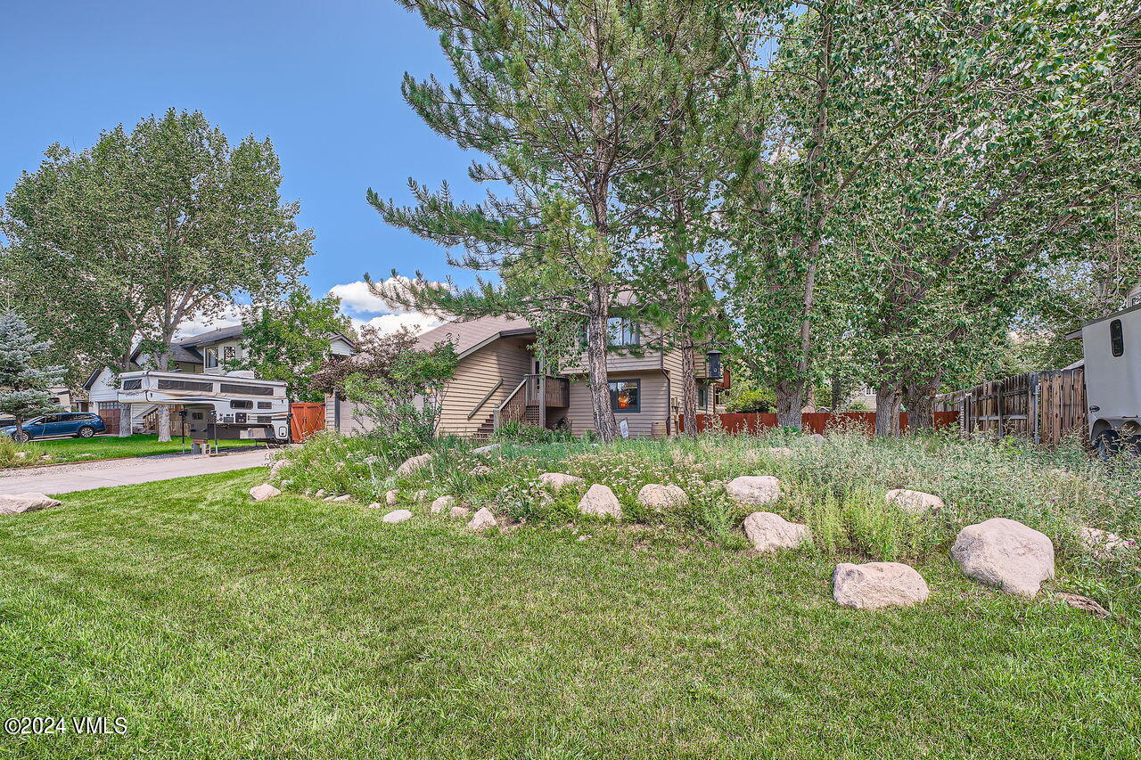 316 Golden Eagle Eagle, CO 81631 - Photo 4 of 25 a front view of a house with garden