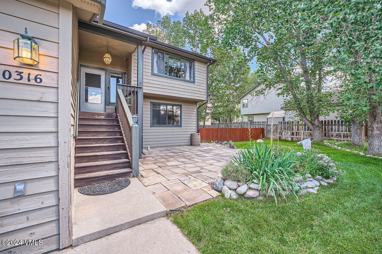 316 Golden Eagle Eagle, CO 81631 - Photo 5 of 25 a front view of a house with garden