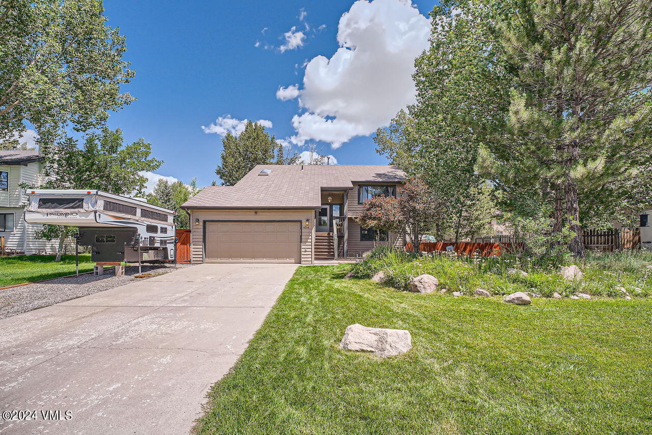 316 Golden Eagle Eagle, CO 81631 - Photo 6 of 25 a front view of a house with garden