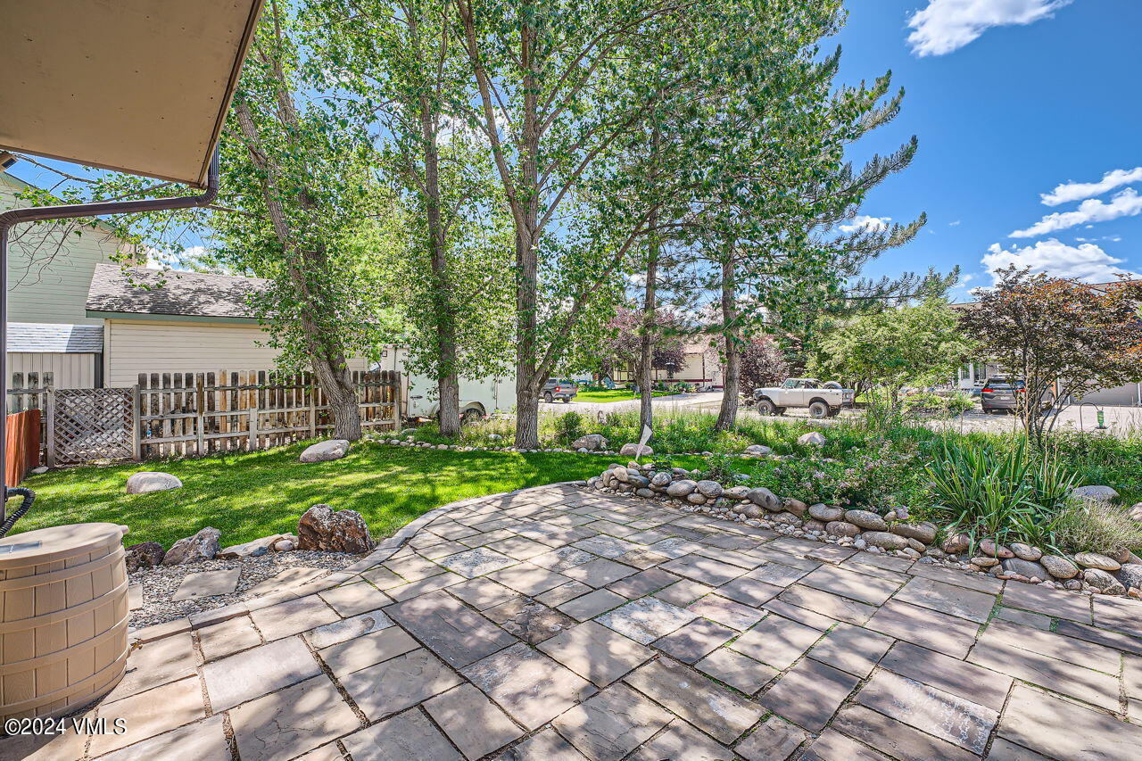 316 Golden Eagle Eagle, CO 81631 - Photo 7 of 25 a view of a backyard with a garden