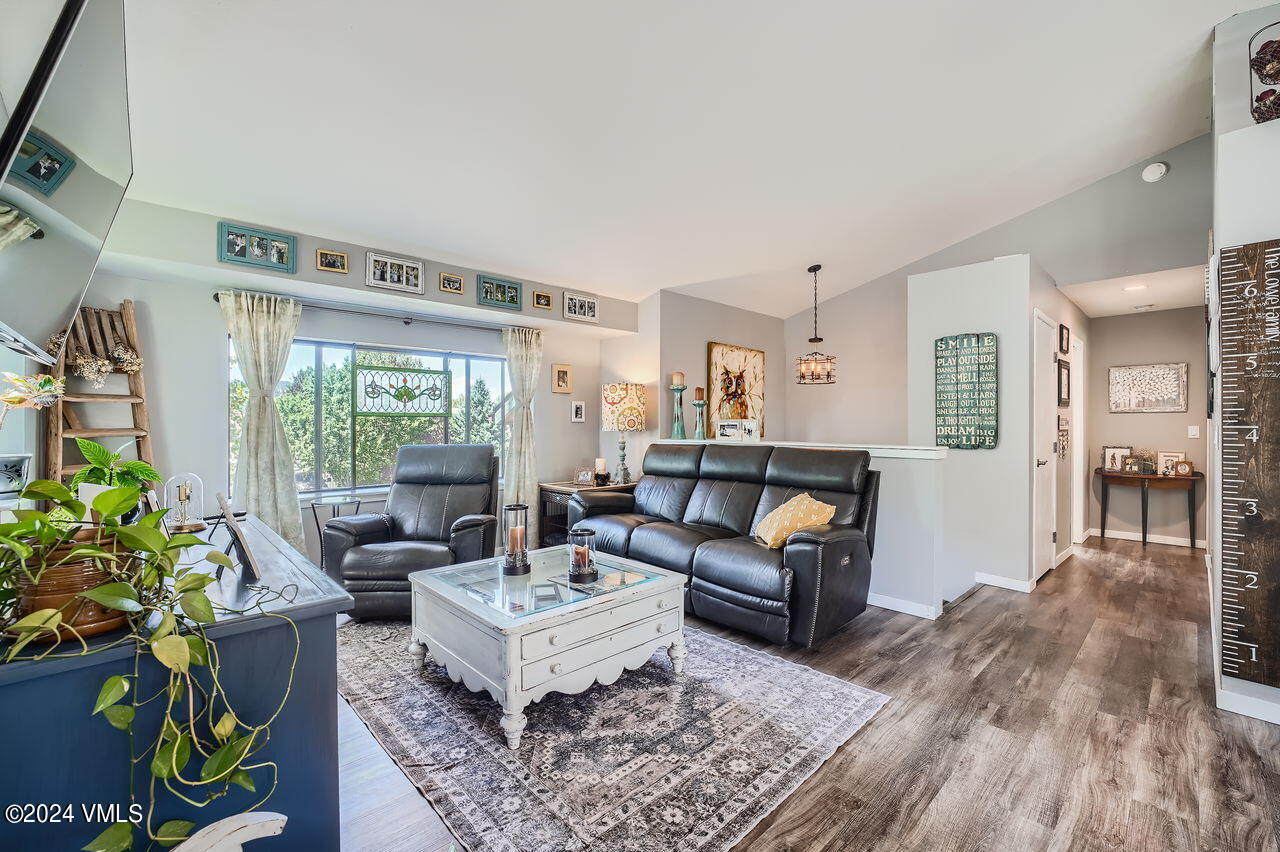 316 Golden Eagle Eagle, CO 81631 - Photo 8 of 25 a living room with furniture and a large window